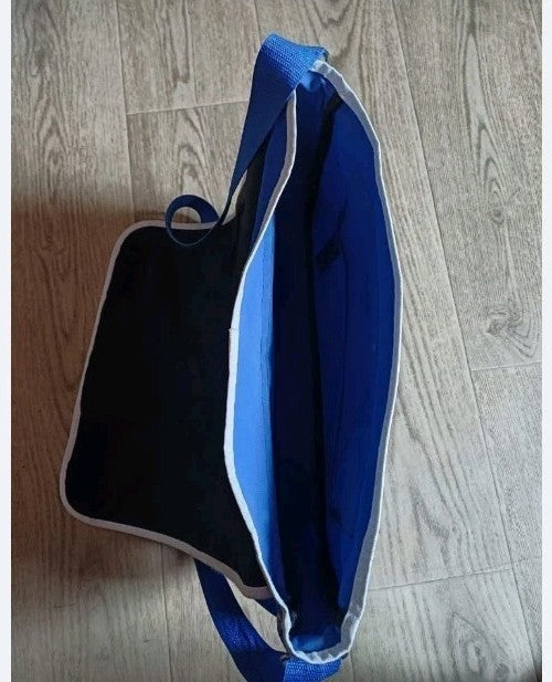 Blue Aeroflot bag front flap with white piping and Velcro closure