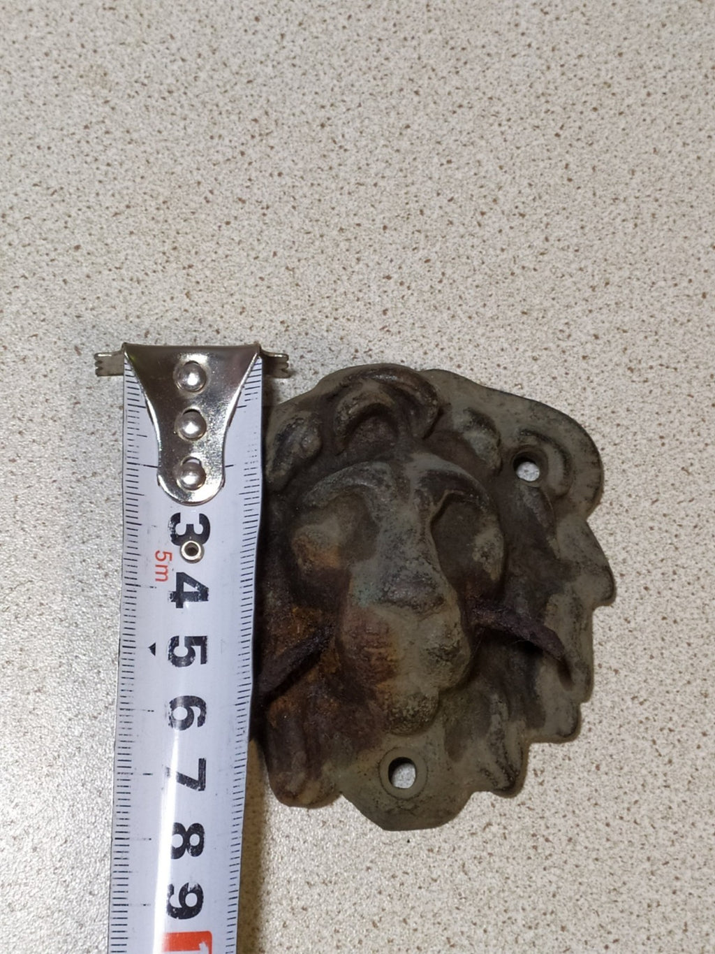 Cast bronze lion head plaque with iron mounting pin remnants in the mouth – detail 11