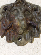 Antique bronze furniture mount, cast lion head relic, angled view