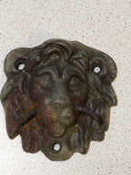 Metal detecting relic lion head door hardware, back side with rust – detail 6