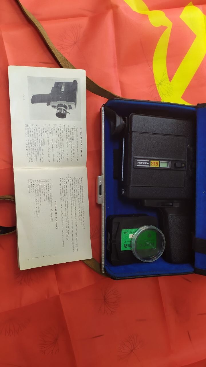 Avrora 215 vintage movie camera with four Super 8 film cassettes