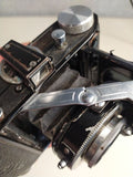 Balda Baldini folding camera with E. Ludwig Meritar 50mm f/2.9 lens, opened