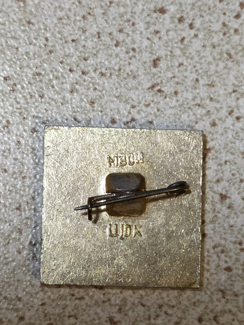 Soviet propaganda pin marking the birth of the Red Army – detail 5
