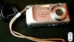 Canon PowerShot A410 3.2MP vintage digital camera with silver body
