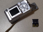 Vintage Canon PowerShot digital camera sold for parts or repair