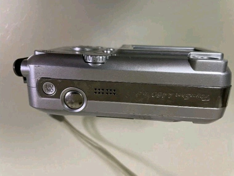 Y2K digital camera Canon A460, close-up of the lens
