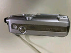 Y2K digital camera Canon A460, close-up of the lens