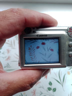 Y2K digital camera Canon A460, close-up of the lens – detail 7