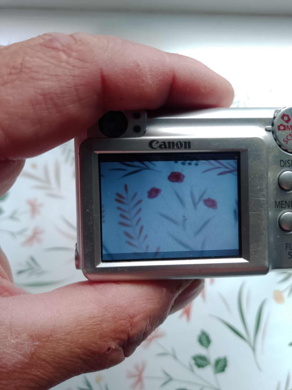 Y2K digital camera Canon A460, close-up of the lens – detail 7