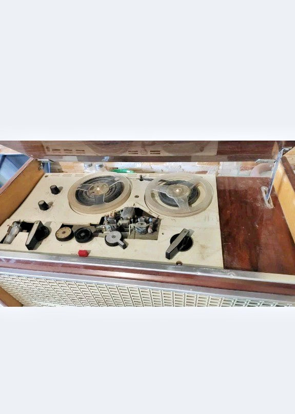 Geometric front speaker grille of the vintage reel to reel recorder