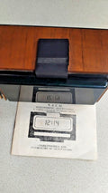 Elektronika 4.13 Soviet digital alarm clock with green VFD display in a wood case