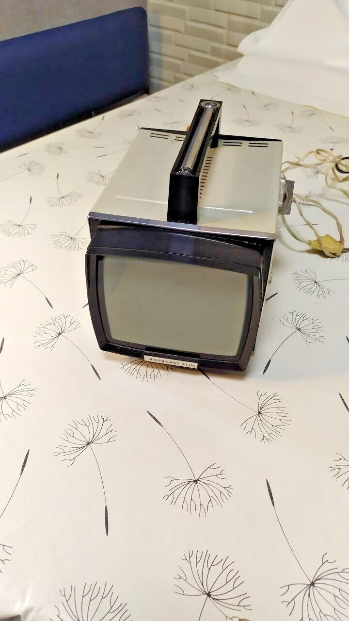 Elektronika VL-100 Soviet portable TV with integrated handle and telescopic antenna