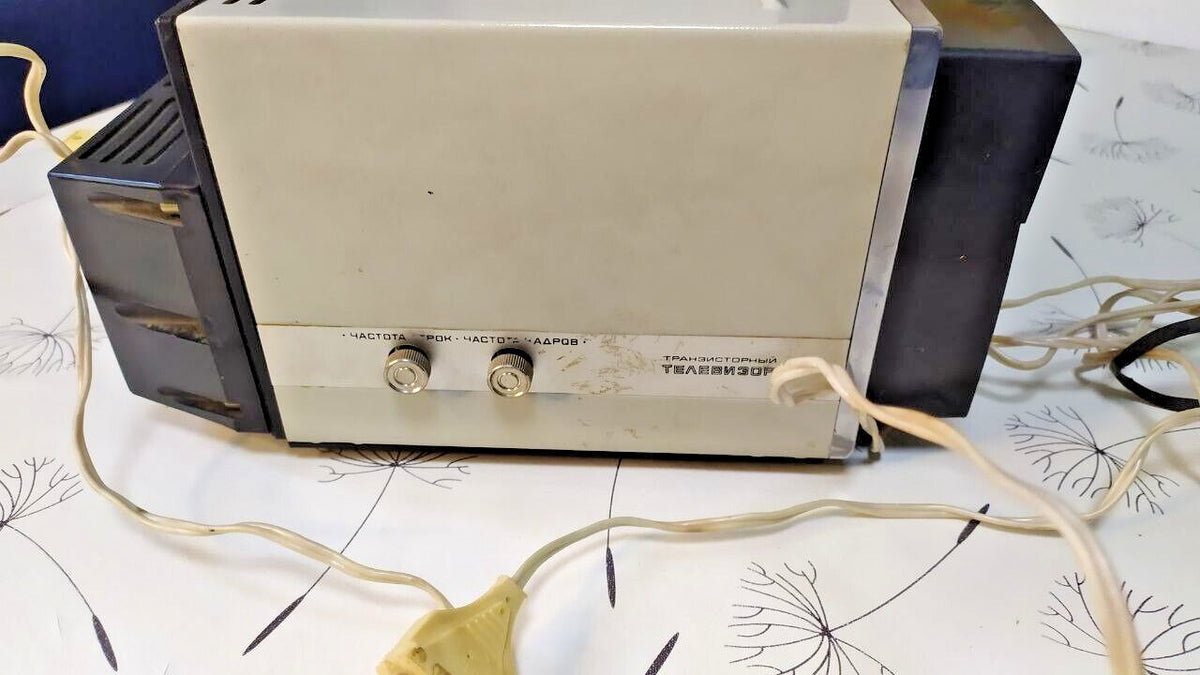 Telescopic antenna and handle on a vintage Soviet portable TV – detail 7