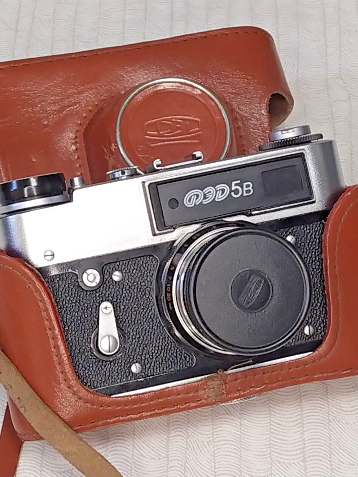 Vintage FED-5B camera with chrome details and faux leather body