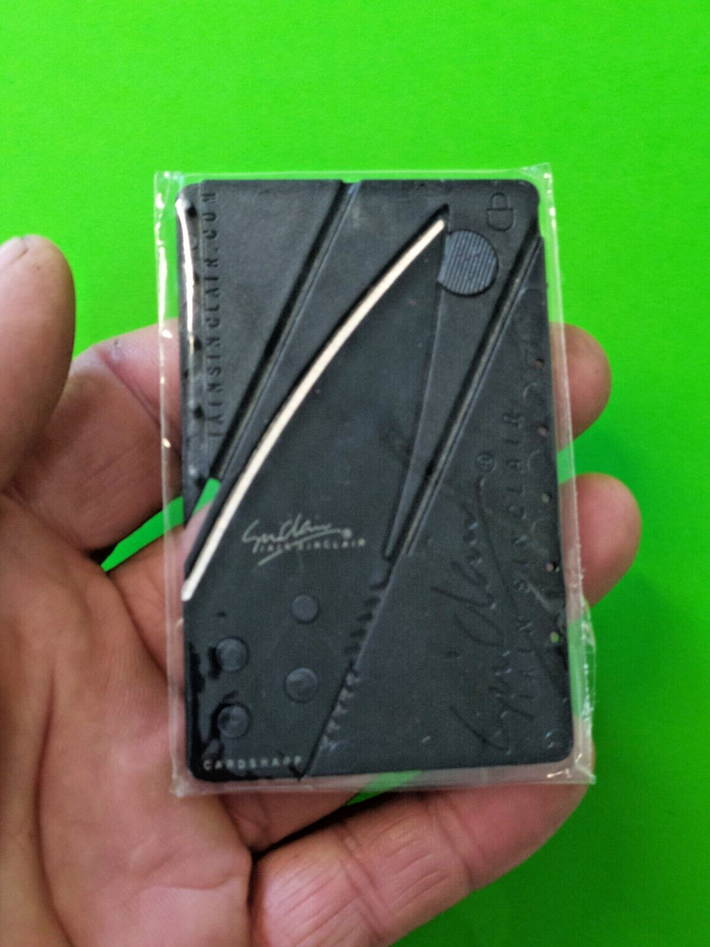 Ultra thin pocket utility tool unfolded into a rigid handle