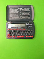 Vintage electronic spell checker clamshell with LCD screen
