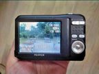 Fujifilm FinePix A850 AA battery compartment and card slot