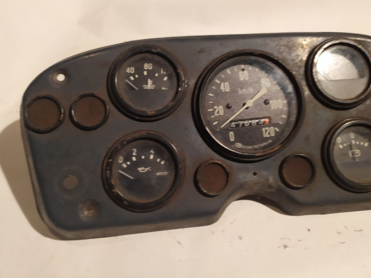 Rear of the GAZ-53 gauge cluster with original housings and bulb sockets