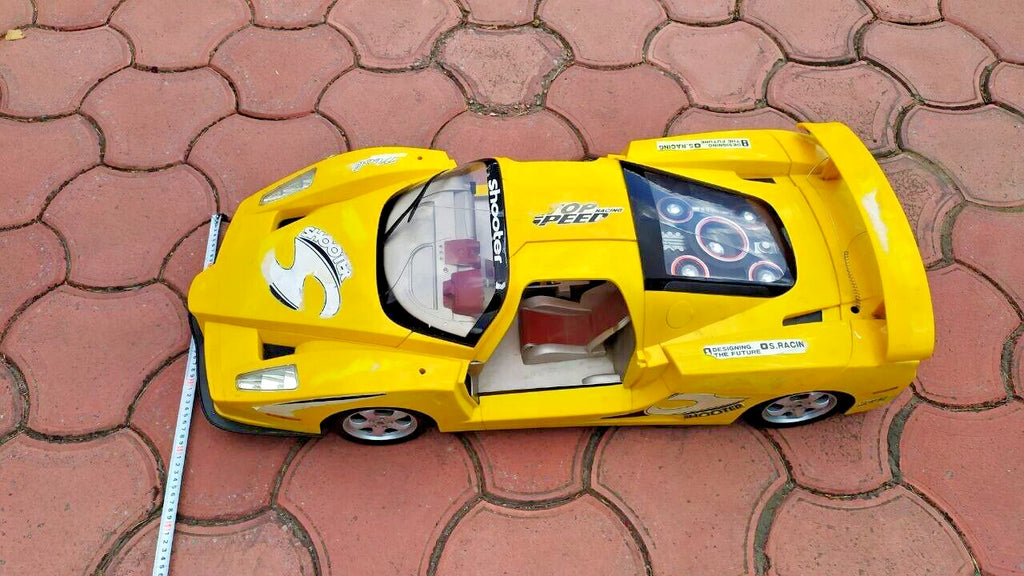 Toy racing car cockpit with two-tone seats and steering wheel – detail 6