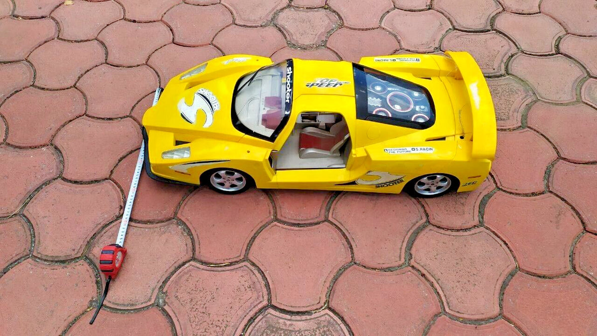 Giant toy car measured with tape, nearly one meter long – detail 7