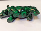 Green stone rhino figurine on a scale showing 106 g – detail 6