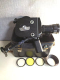 Krasnogorsk-3 16mm Soviet movie camera with Meteor-5-1 M42 lens, black body