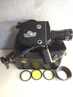 Krasnogorsk-3 16mm Soviet movie camera with Meteor-5-1 M42 lens, black body