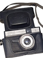 Vintage Smena Symbol camera with original black case and LOMO logo