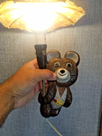 Vintage Soviet lamp with Misha bear lit up, showing the warm glow