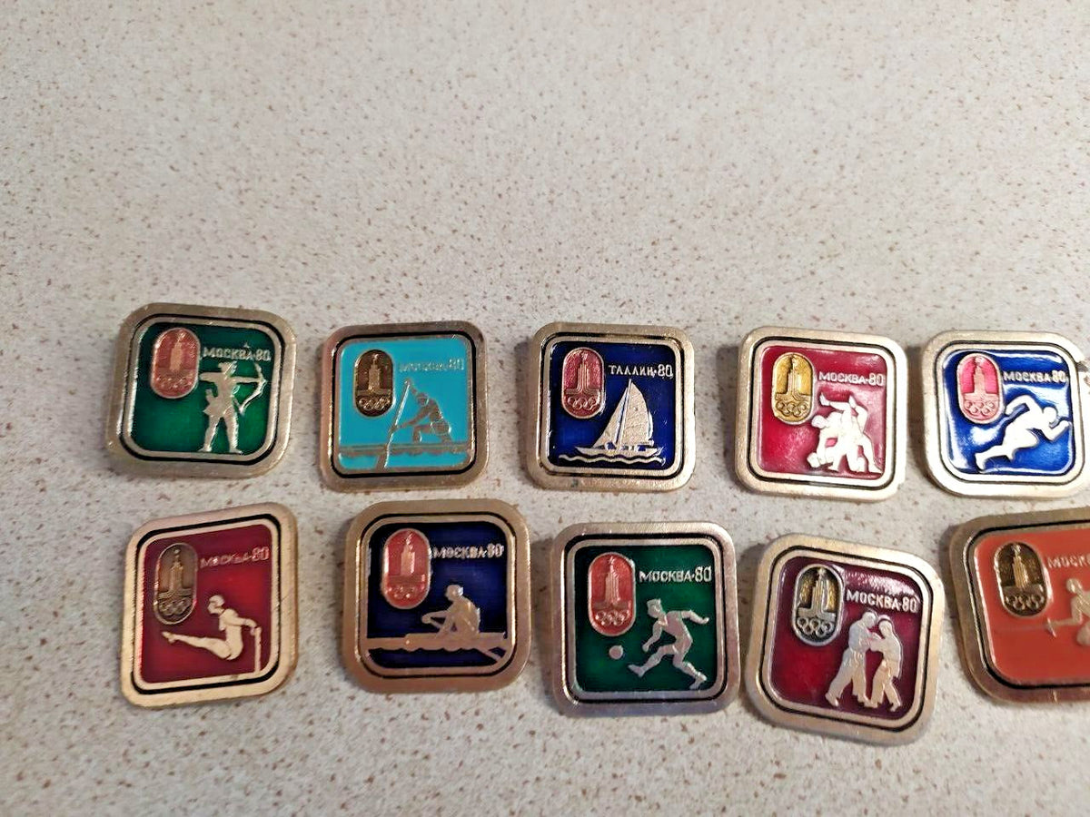 Soviet Moscow 80 Olympic pins with sports themes and Kremlin tower emblem