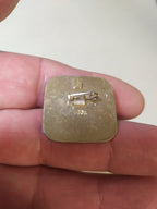 Back of the Moscow 1980 Olympic archery pin