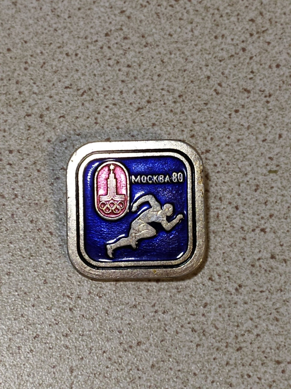 Vintage Soviet Olympic pin with running athlete
