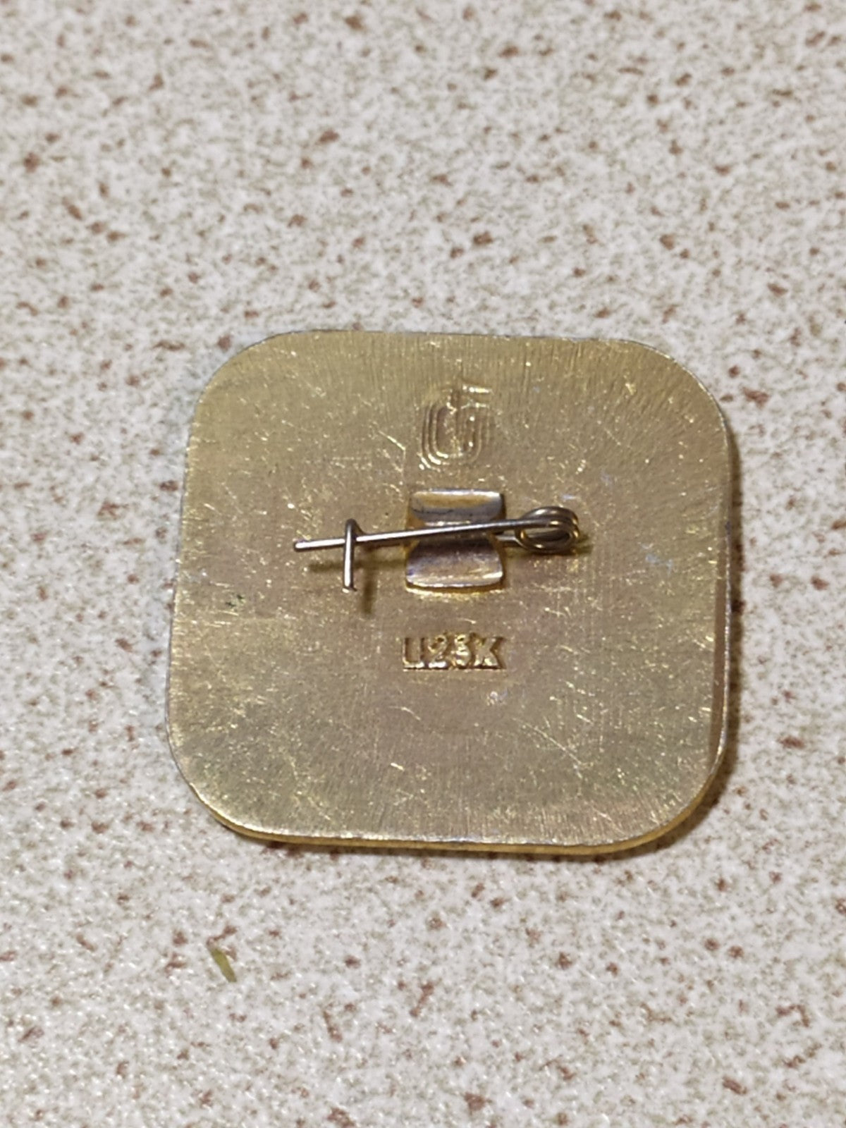 Old Olympic gymnastics pin reverse and fastening