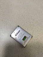 Light scratches around the lens frame of the Nikon compact camera – detail 6