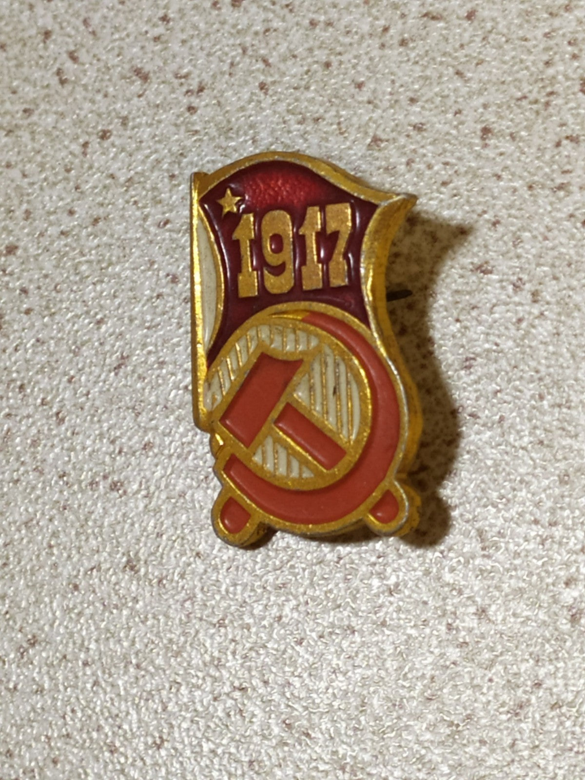 USSR badge with Soviet flag in red enamel, close-up