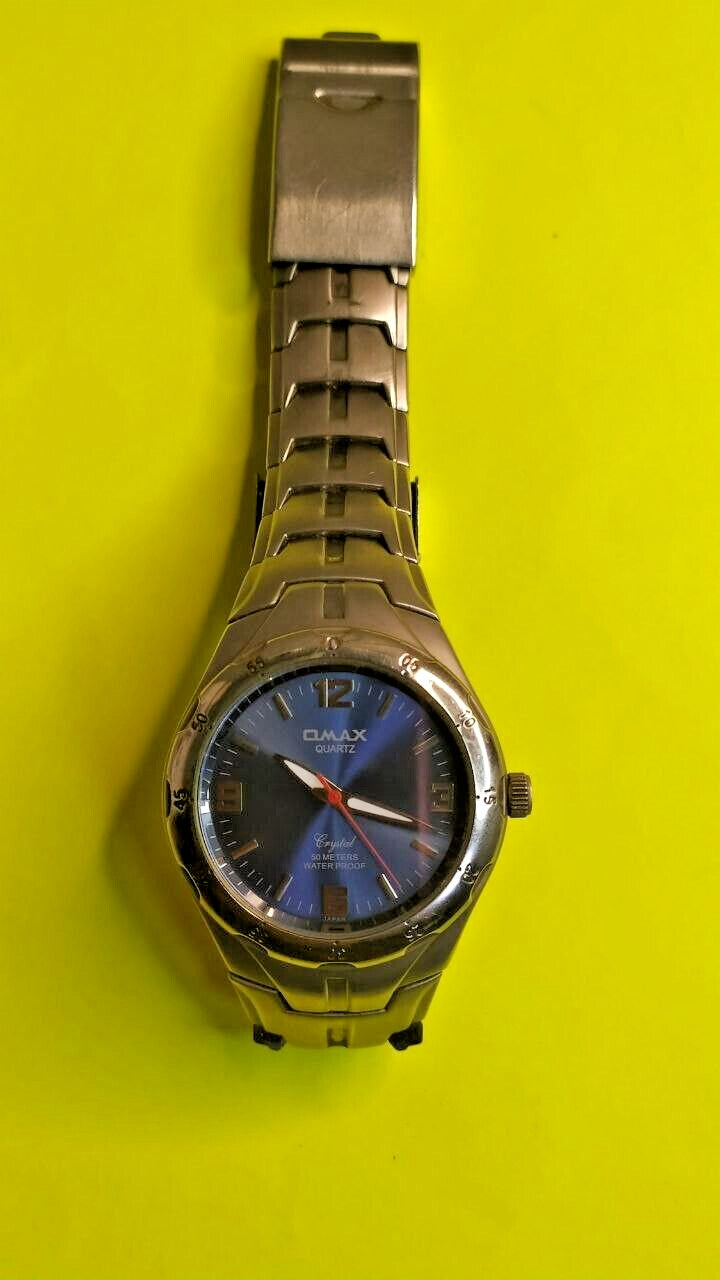OMAX Crystal men's quartz watch with blue sunburst dial and steel bracelet