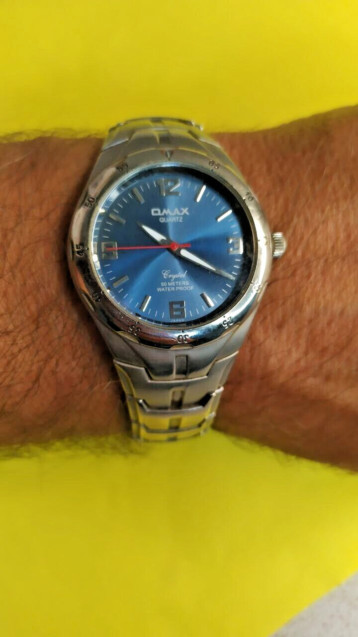 OMAX Crystal wristwatch with fold-over clasp