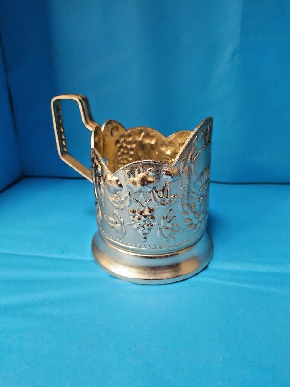 Soviet tea glass holder side view showing the hammer and sickle design – detail 9