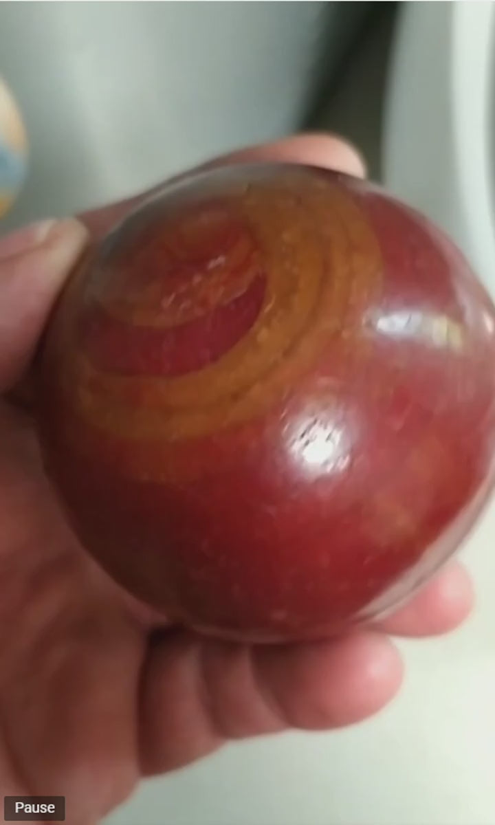Vintage cherry red marbled Bakelite Catalin sphere, video