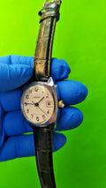 Vintage Raketa Soviet mechanical watch with white dial and date window
