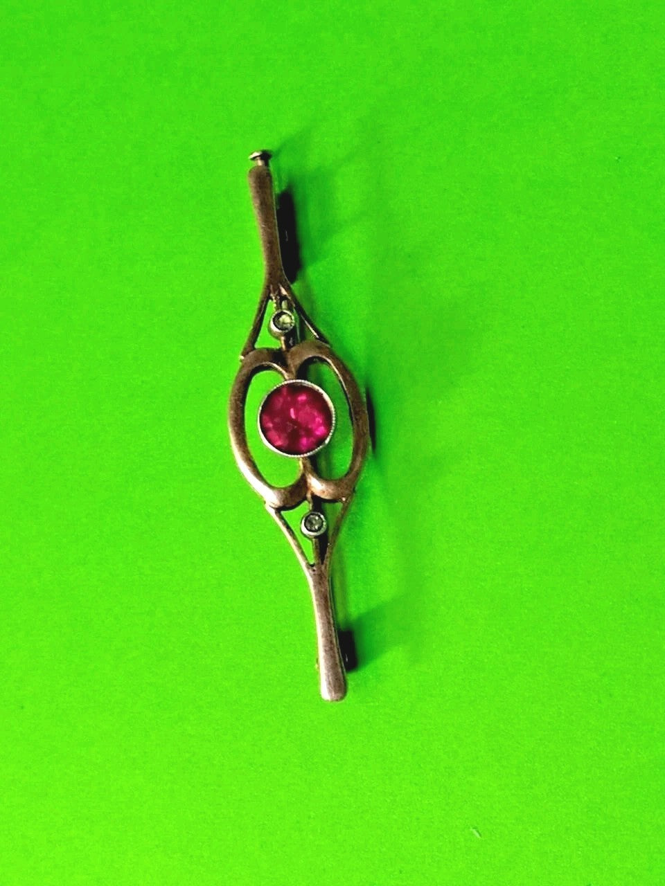 Soviet style silver brooch with red stone, front detail