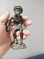 Soviet bronze goalkeeper figurine of a boy in gloves and cap, solid bronze with dark patina