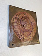 Heavy Soviet border post emblem with scratches and oxidation from field use