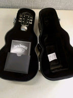 Back of Jack Daniel's guitar case with embossed music history text