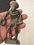 Fine casting detail on cap and goalkeeper gloves of Soviet football figurine