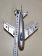 Vintage Soviet toy jet with blue-painted canopy and red star on the tail fin – detail 14
