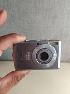 Old Canon digital camera with charger and USB cable – detail 12