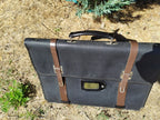 Detachable organizer panel with slots for pens and notebooks in USSR attaché case