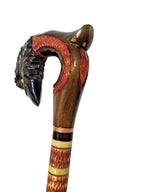 Detailed raven head handle with feather texture on a wooden cane – detail 14