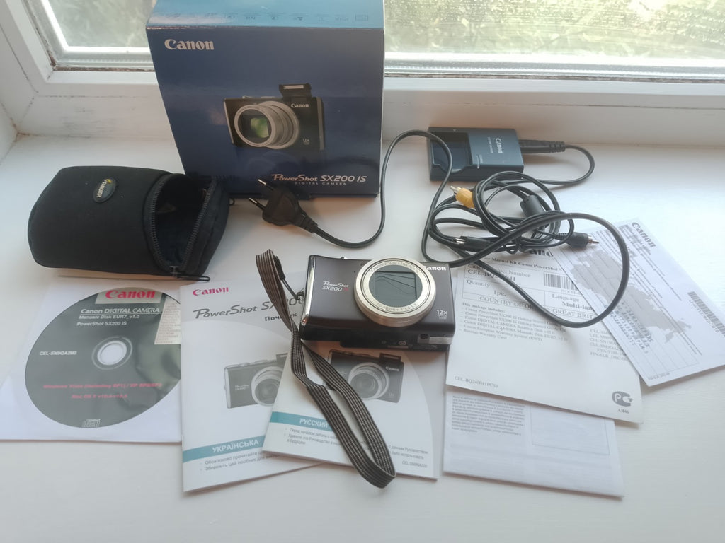 TESTED digital camera CANON PowerShot SX200 IS 12.1 MP, black, (full set). Japan